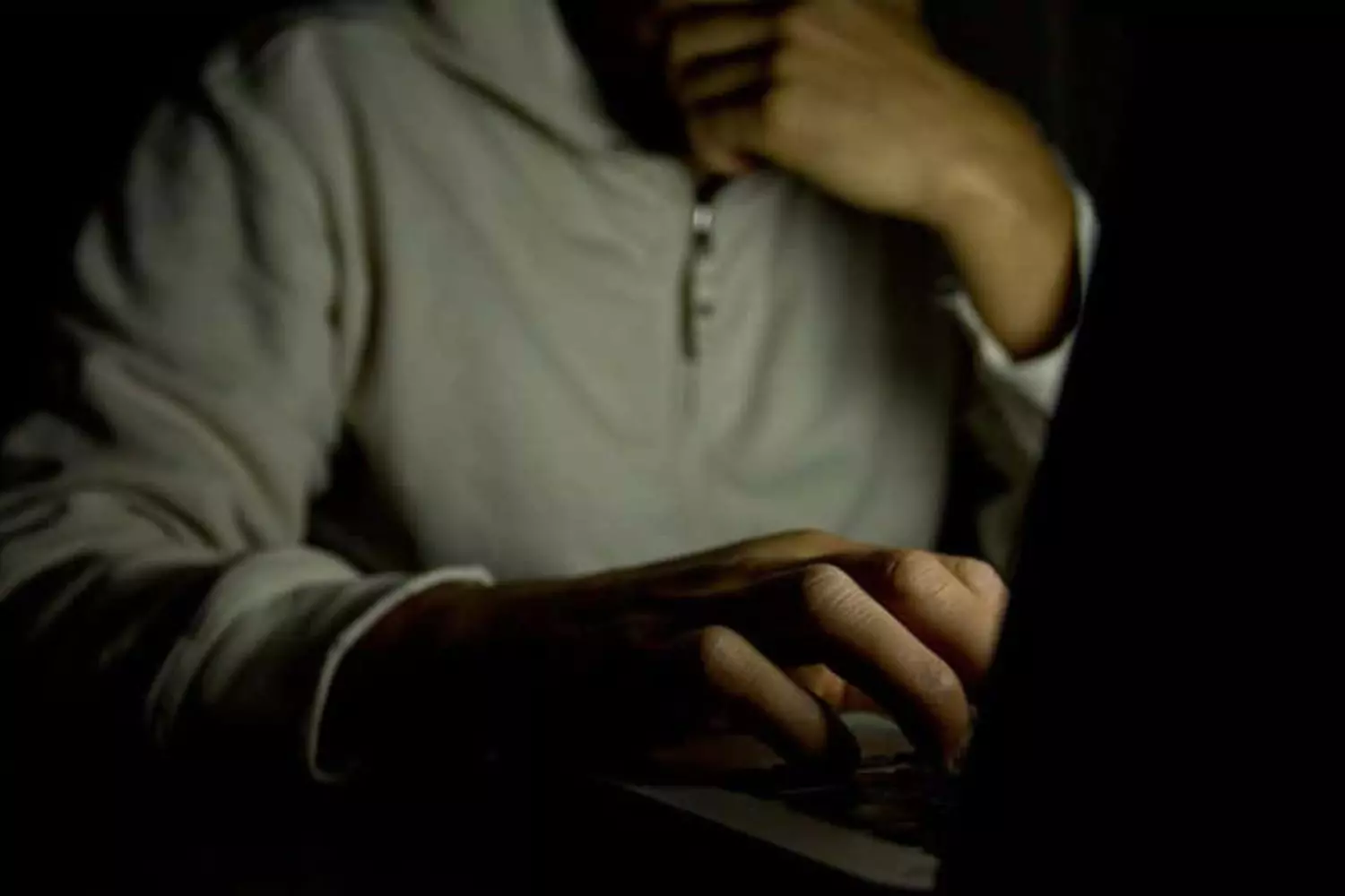 Teen looking at the laptop