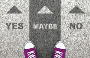 A girl in pink shoes stands between three abortion options: yes, maybe, no.