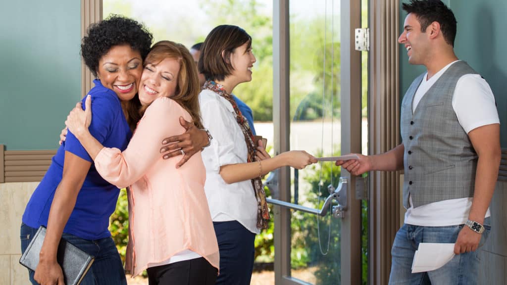 People-in-church-greeting-other
