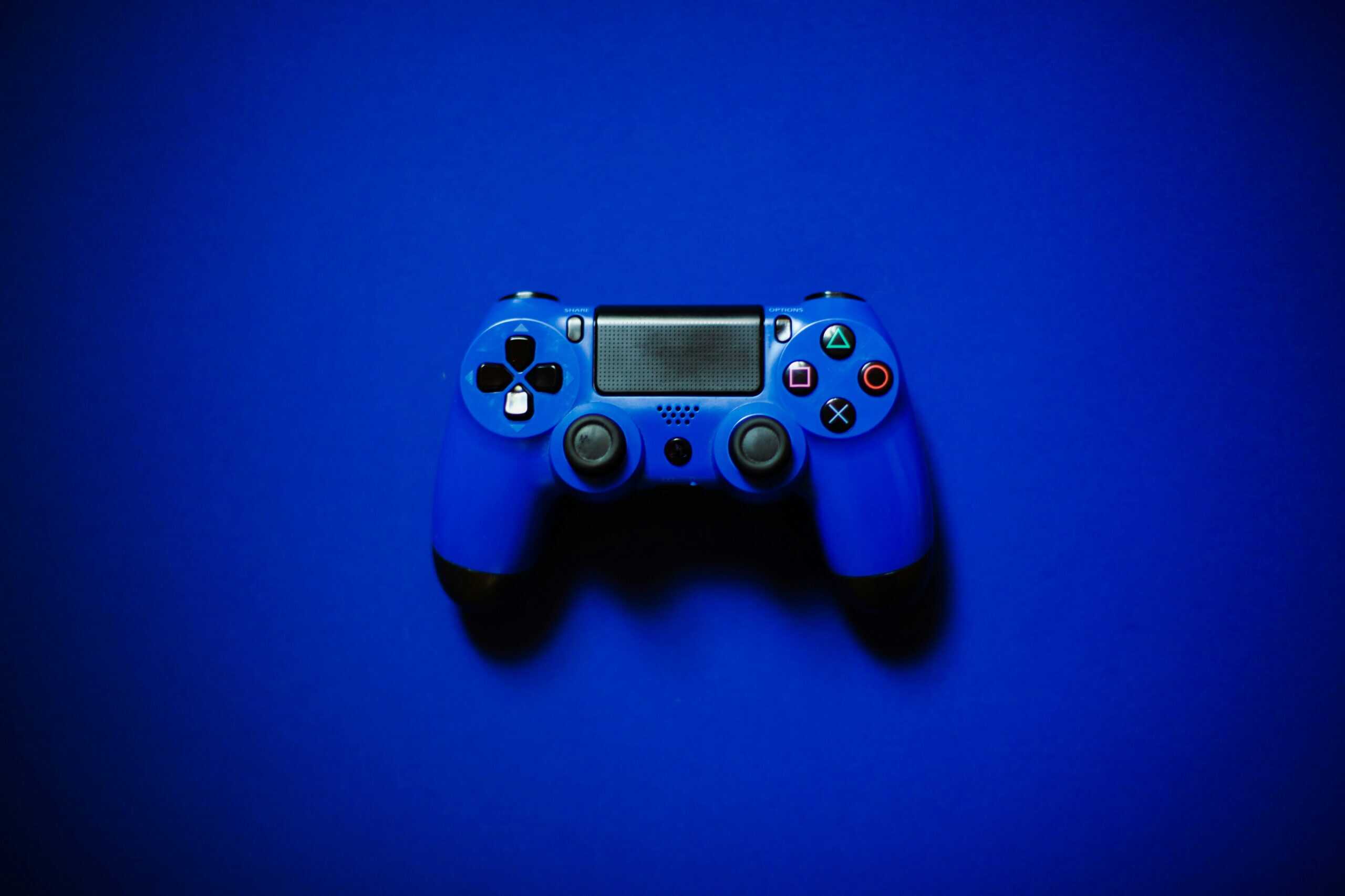 This image shows a blue controller in front of a blue background, set to describe the idea of video games. What does the bible say about video games?